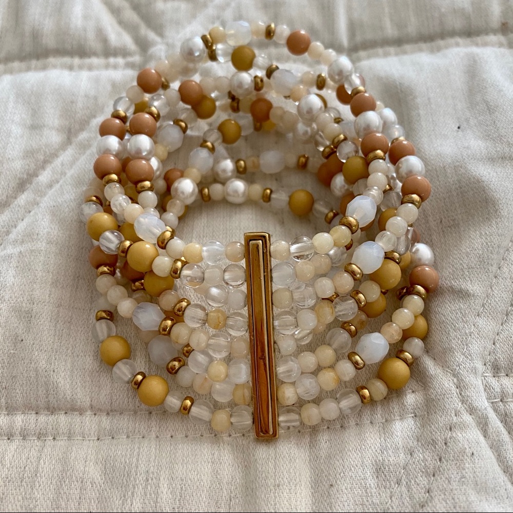MULTI STRAND BEAD BRACELET IN WHITE TAN AND GOLD - Picture 1 of 7